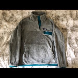 Grey Patagonia outlines teal blue